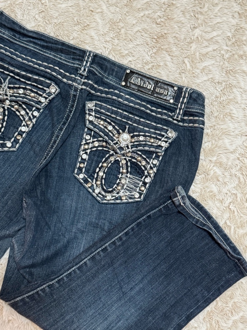 Vintage LA Idol Dark wash low rise capri jeans with rhinestone details.